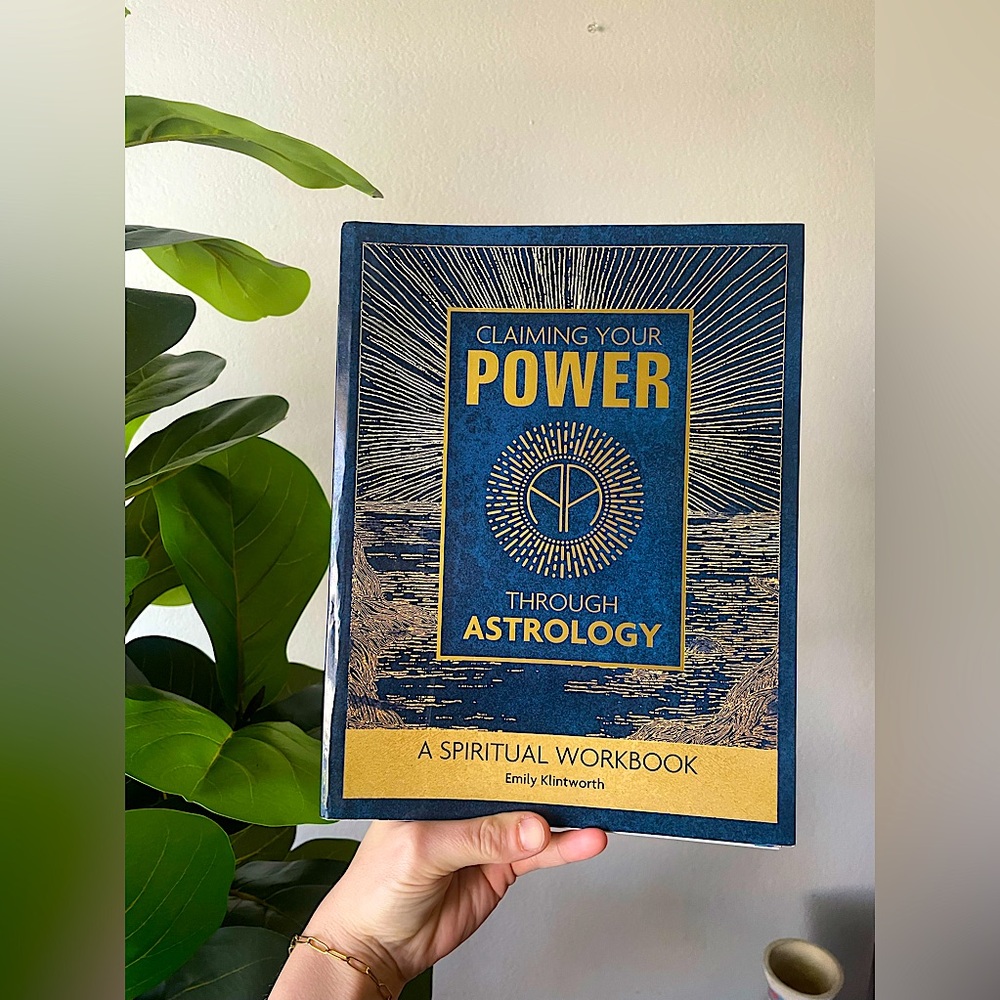 Claiming Your Power Through Astrology A Spiritual Workbook by Emily Klintworth